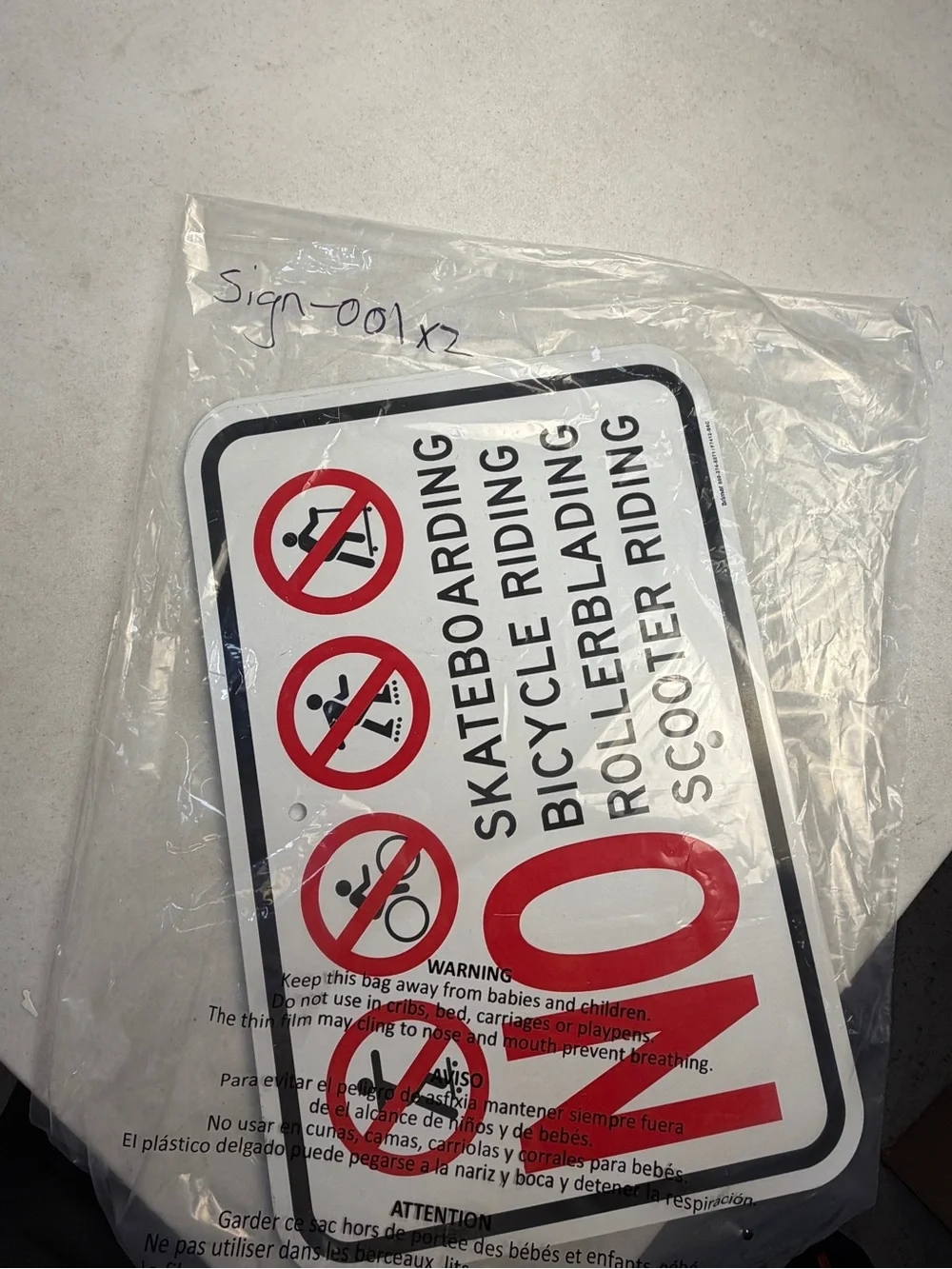 No Skateboarding & No Trespassing Red and White Warning Signs